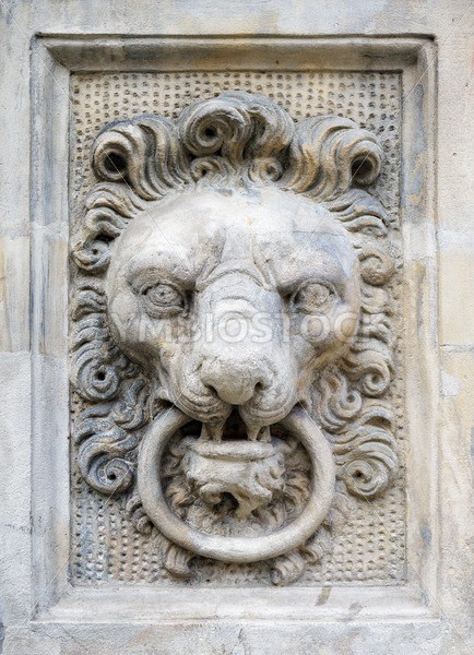 Stone lion head on a wall - GlobePhotos - royalty free stock images