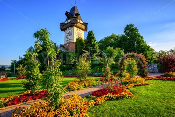 The historical Clock tower Uhrturm in the city park, Graz, Austria - GlobePhotos - royalty free stock images