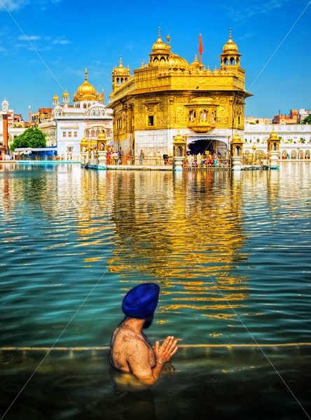 Sikh prayer in lake of Golden Temple, Amritsar, India - GlobePhotos - royalty free stock images