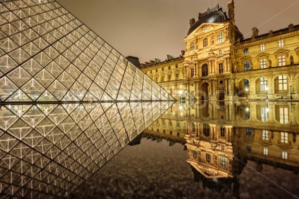 Louvre museum and glass Pyramid at night, Paris, France - GlobePhotos - royalty free stock images