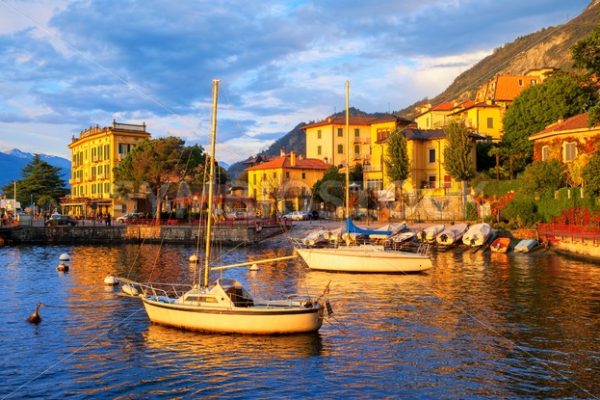 Yachts in a harbour on Lake Como, Italy, on sunset - GlobePhotos - royalty free stock images