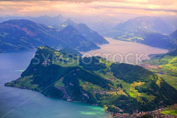 Swiss Alps mountains and Lake Lucerne on dramatic sunset - GlobePhotos - royalty free stock images