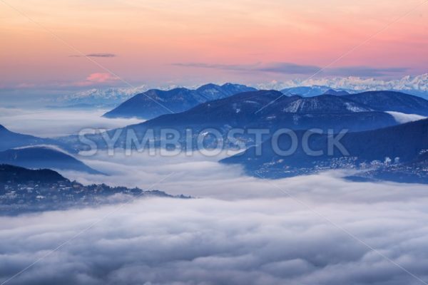 Clouds over Lake Lugano and swiss Alps, Switzerland - GlobePhotos - royalty free stock images