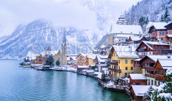 Hallstatt town on a lake in Alps mountains, Austria, in winter - GlobePhotos - royalty free stock images