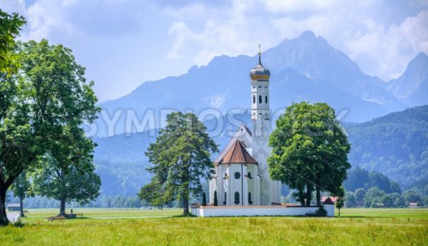 Landscape with white church and Alps mountains, Germany - GlobePhotos - royalty free stock images