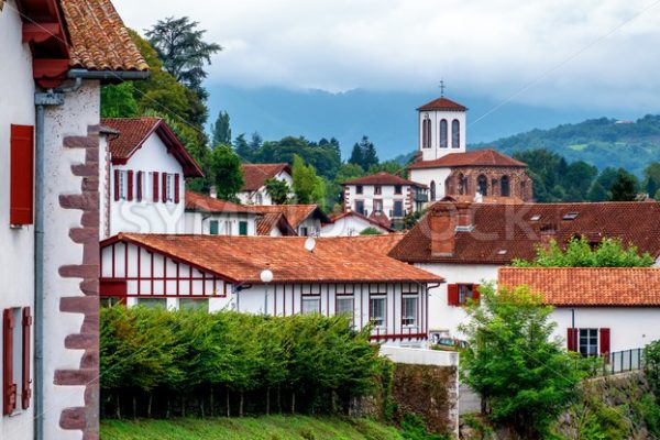 White basque houses in Pyrenees mountains, Saint Jean Pied de Port, France - GlobePhotos - royalty free stock images