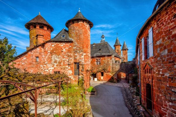 Collonges-la-Rouge, red brick houses and towerd of the Old Town, France - GlobePhotos - royalty free stock images