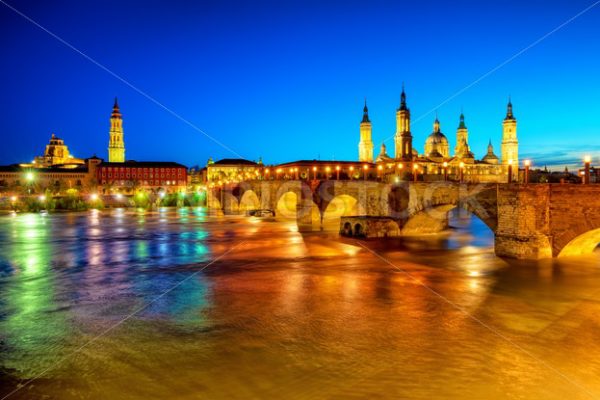 Zaragoza city, Spain, view over river to Cathedral at sunset - GlobePhotos - royalty free stock images