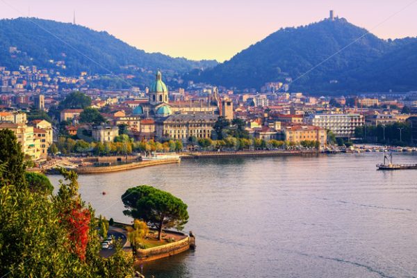 Como city town center on Lake Como, Italy, in warm sunset light - GlobePhotos - royalty free stock images