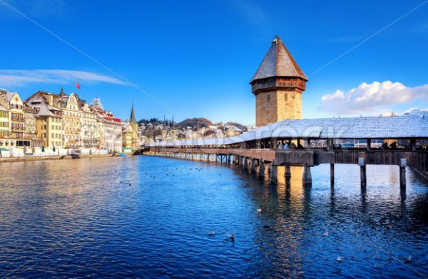 Lucerne, Switzerland, Chapel Bridge with white snow in winter - GlobePhotos - royalty free stock images