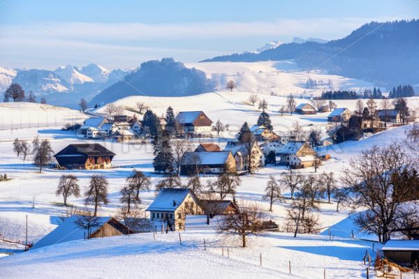 A snow covered village in swiss Alps, Switzerland, in winter time - GlobePhotos - royalty free stock images