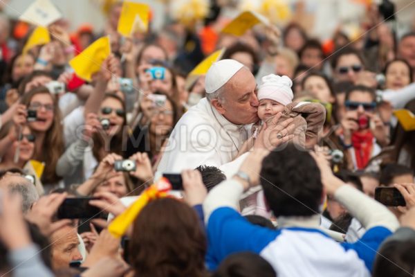 Pope Francis I kisses a child, Vatican City, Rome, Italy - GlobePhotos - royalty free stock images