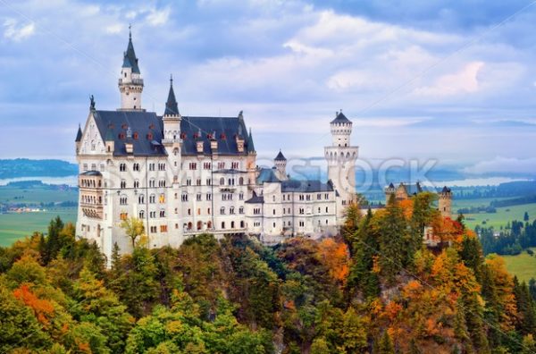 Castle Neuschwanstein in bavarian Alps in early morning light - GlobePhotos - royalty free stock images