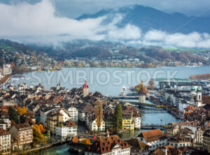 Lucerne city on Lake Lucerne and the misty Alps mountains, Switzerland - GlobePhotos - royalty free stock images