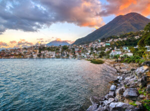 San Pedro La Laguna town on Lake Atitlan, Guatemala, on dramatic sunset - GlobePhotos - royalty free stock images