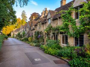 Traditional stone row houses in Castle Combe village, Cotswolds, England